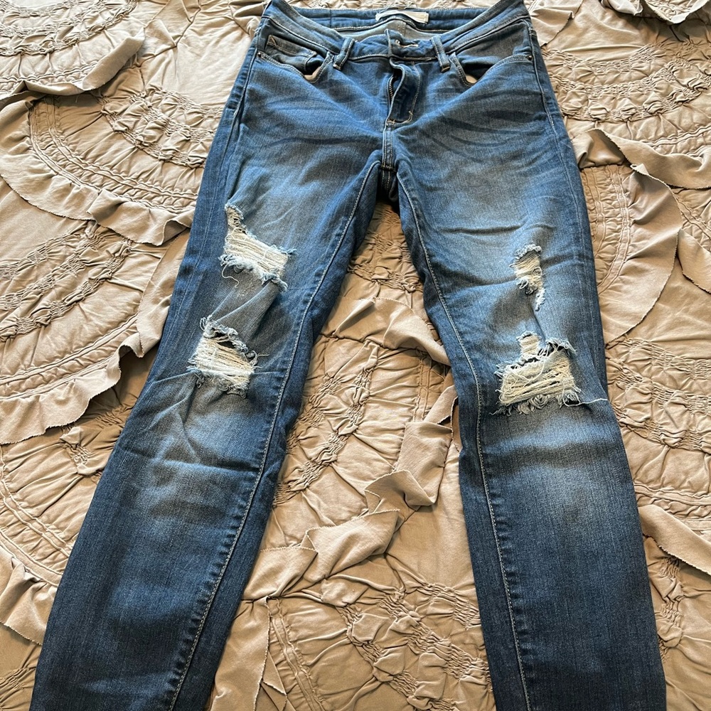 Hidden Jeans, size 29. Skinny with frayed bottom, rips at knees. Good stretch.